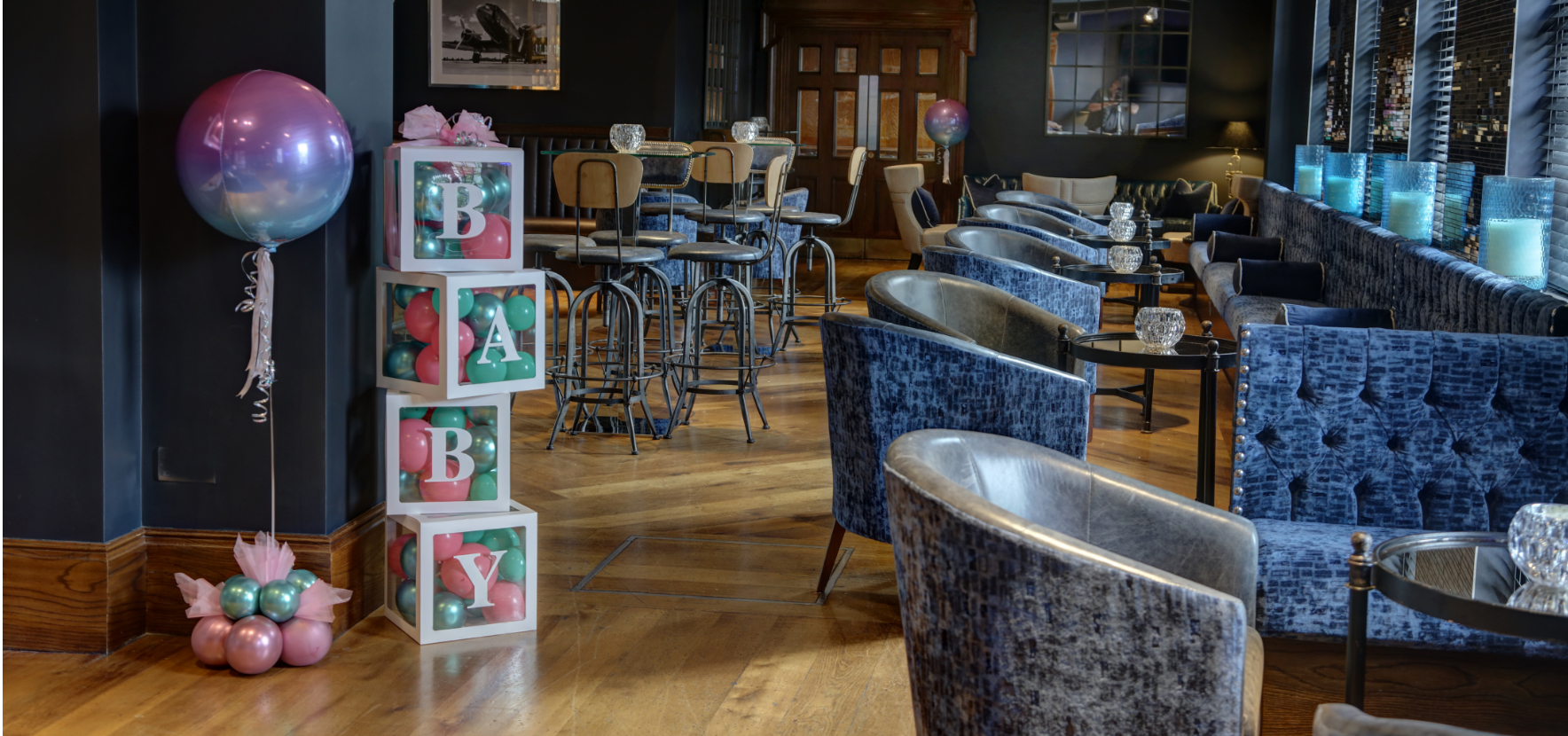 Image showing how baby showers would be laid out at the Manor Hotel Solihull, big block spelling out baby are arranged in front of a seating area